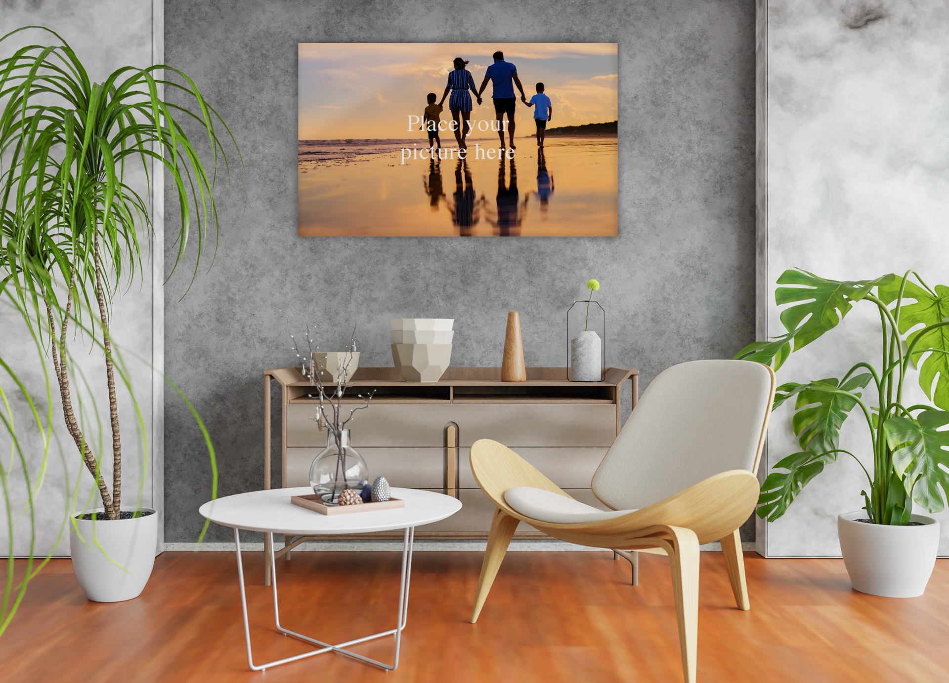 A metal print of two girls with their dog in a wildflower field, displayed on a living room wall